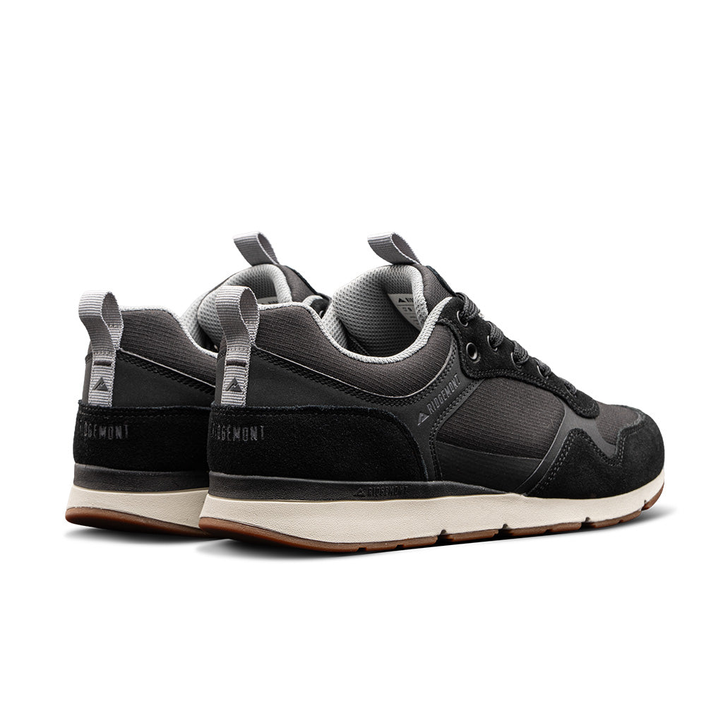 Pair of Ridgemont Escape sneaker in color Black with black micro ripstop poly, black oil suede, CMEVA midsole, real rubber sole color gum, grey inner lining. Ridgemont shoes, shoe, sneaker, sneakers, low-rise sneaker, low-rise shoe, outdoor sneaker, outdoor sneakers, outdoor shoe, outdoor shoes. Everyday shoe, everyday shoes, everyday sneaker, everyday sneakers. Comfortable everyday sneaker.