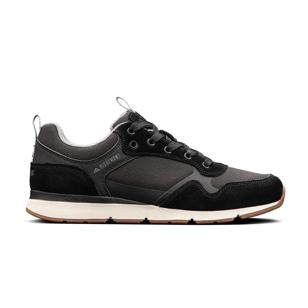 A Ridgemont Escape shoe in color Black showing side view. Shoe is made with black micro ripstop poly, black oiled suede, black laces, grey inner lining, CMEVA midsole, and a real rubber tread. Ridgemont sneaker, outdoor shoe/shoes, outdoor sneaker/sneakers.