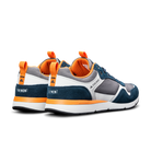 Ridgemont Escape shoe sneaker in color Navy Charcoal heel cross side view. Shoe is made with grey/gray micro ripstop poly, navy oiled suede, navy laces, orange inner lining, DWR coating, white and orange CMEVA midsole, real rubber tread in color black. Ridgemont sneaker, outdoor shoe, everyday shoe, everyday sneaker, comfort, nature, comfort, comfortable. Perfect for adventure, outdoors, outside, nature. Independent footwear brand.