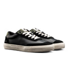 Ridgemont Flint skate shoe in Black Olive side view with white laces, black suede and black leather with olive green canvas. The Flint has a real vulcanized instruction, white foxing, genuine oiled suede, rubber herringbone tread, breathing vents, extra thick PU insole, and leather upper. 