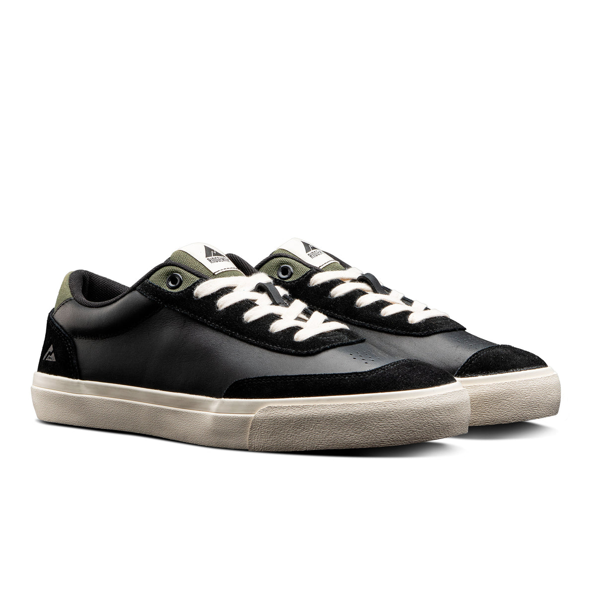 Ridgemont Flint skate shoe in Black Olive side view with white laces, black suede and black leather with olive green canvas. The Flint has a real vulcanized instruction, white foxing, genuine oiled suede, rubber herringbone tread, breathing vents, extra thick PU insole, and leather upper. 
