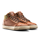 Pair of Ridgemont Outback Boot in colors Brown Olive with cream (off-white) foxing, brown laces, green cotton canvas, and lace hooks. Showing cross view of shoes. Outdoor boot, outdoor shoe. 