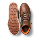Pair of Ridgemont Outback boots in colors Brown Olive showing one shoe with full grain leather, brown laces, gusseted tongue and DWR coating, green waxed cotton canvas, orange inner lining, and other shoe displaying gum colored sole real rubber lugged tread. Outdoor boot, outdoor boots, outdoor shoe, outdoor shoes.