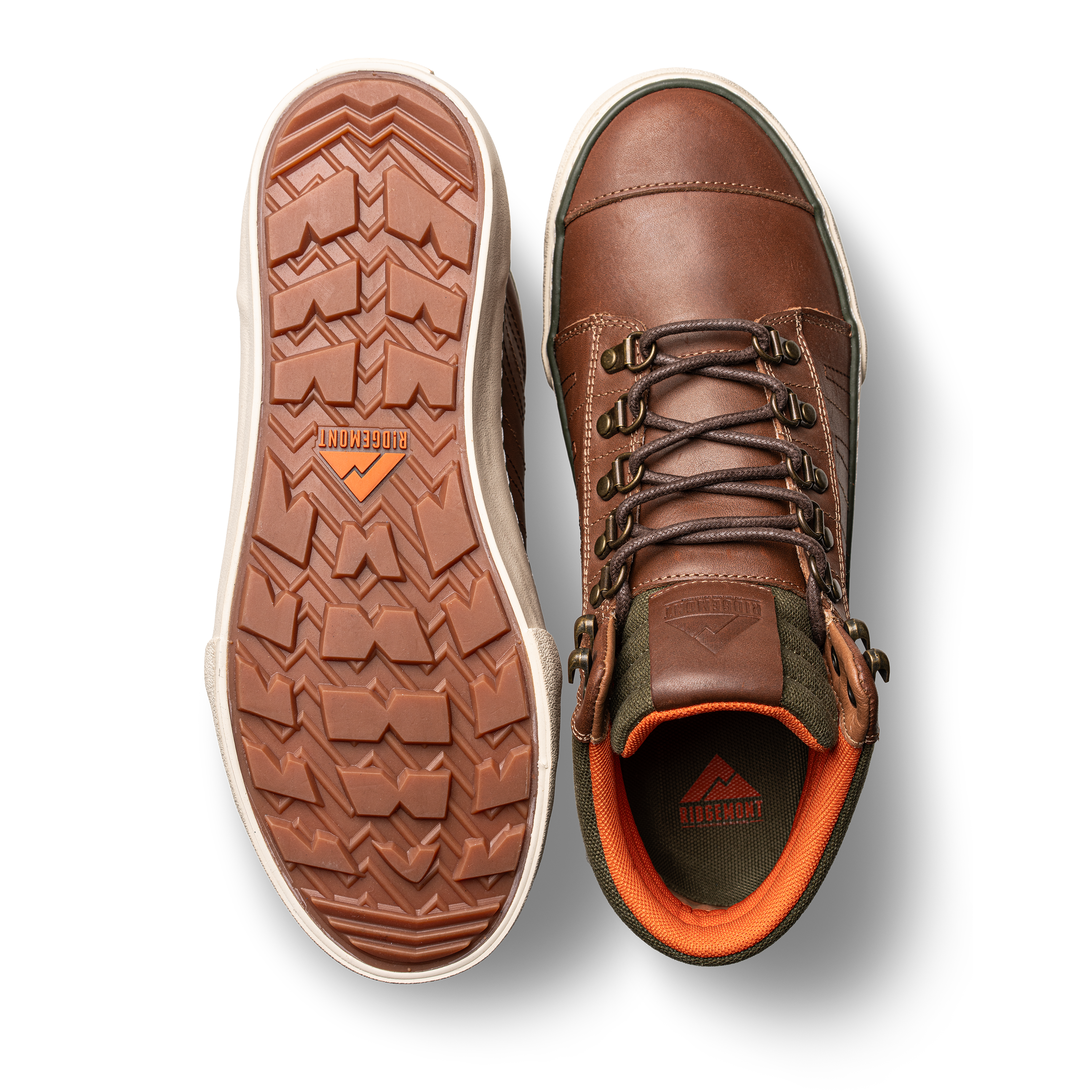 Pair of Ridgemont Outback boots in colors Brown Olive showing one shoe with full grain leather, brown laces, gusseted tongue and DWR coating, green waxed cotton canvas, orange inner lining, and other shoe displaying gum colored sole real rubber lugged tread. Outdoor boot, outdoor boots, outdoor shoe, outdoor shoes.