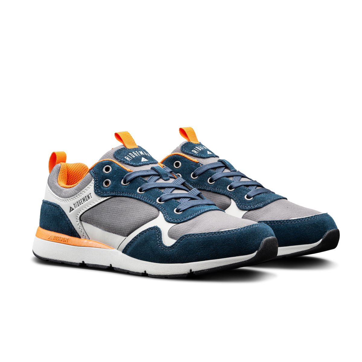Ridgemont Escape shoe sneaker in color Navy Charcoal showing side cross view. Shoe is made with grey/gray micro ripstop poly, navy oiled suede, navy laces, orange inner lining, DWR coating, white CMEVA midsole, and a real rubber tread in color black. Ridgemont sneaker is an outdoor shoe, everyday in-town shoe, everyday sneaker. Made for adventure, nature, comfort, comfortable, indepedent.
