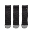 Ridgemont Staple Quarter Black 3 Pack with gray heels and toes, arranged side by side on a white background. Each sock features a small white mountain logo near the top and a white letter 7 near the heel.